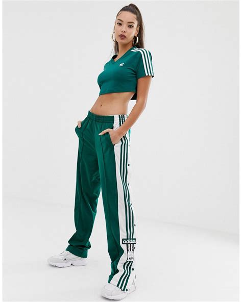 adidas broek met drukknopen aubergine kleur|adidas broek damen.